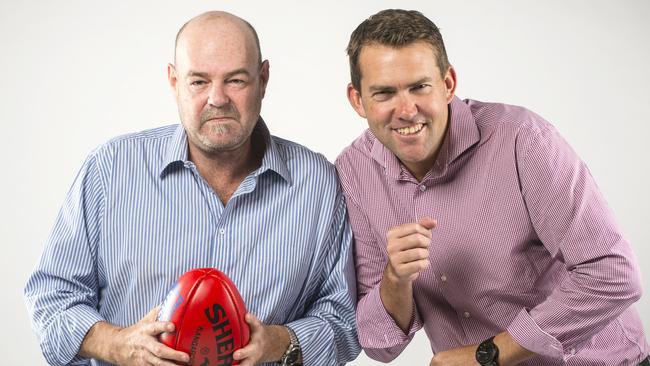 Herald Sun footy writers Mark Robinson and Jon Ralph. Picture: Eugene Hyland