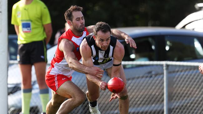 Action from TSL game between Clarence v Glenorchy from Richmond Oval. Clarence's Clint Riley tackles Glenorchy's Jaye Bowden. Picture: Zak Simmonds