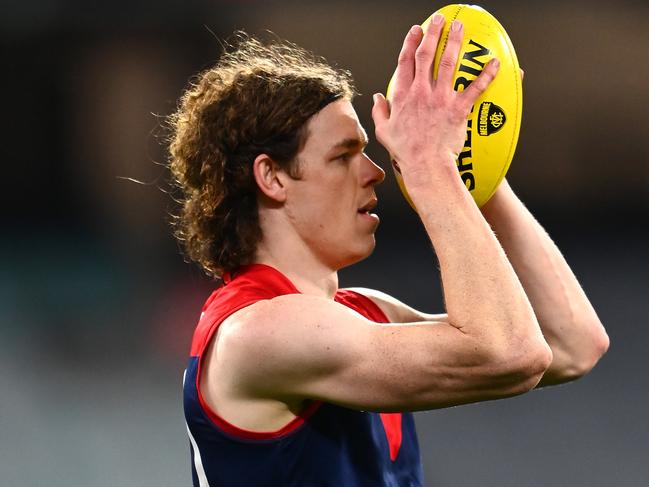 MELBOURNE, AUSTRALIA - JULY 24: Ben Brown of the Demons lines up a shot at goal during the round 20 AFL match between Melbourne Demons and Western Bulldogs at Melbourne Cricket Ground on July 24, 2021 in Melbourne, Australia. (Photo by Quinn Rooney/Getty Images)