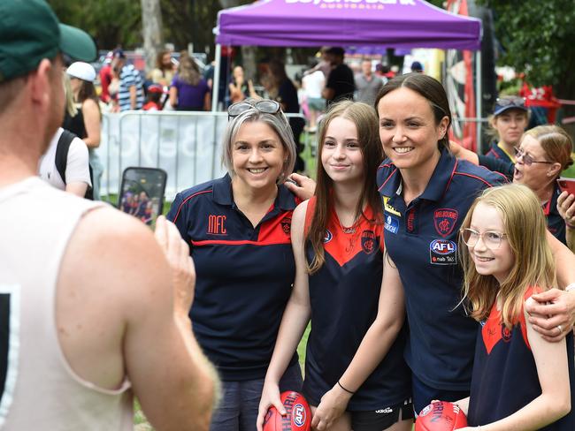 MELBOURNE, AUSTRALIA - NewsWire Photos, FEBRUARY 25, 2023. Melbourne Football Family Day at Yarra Park, Melbourne. (L-R) Kim Orr, Katelyn Orr (130, former AFLW player Daisy Pearce and Grace Orr (11). Picture: NCA NewsWire / Josie Hayden