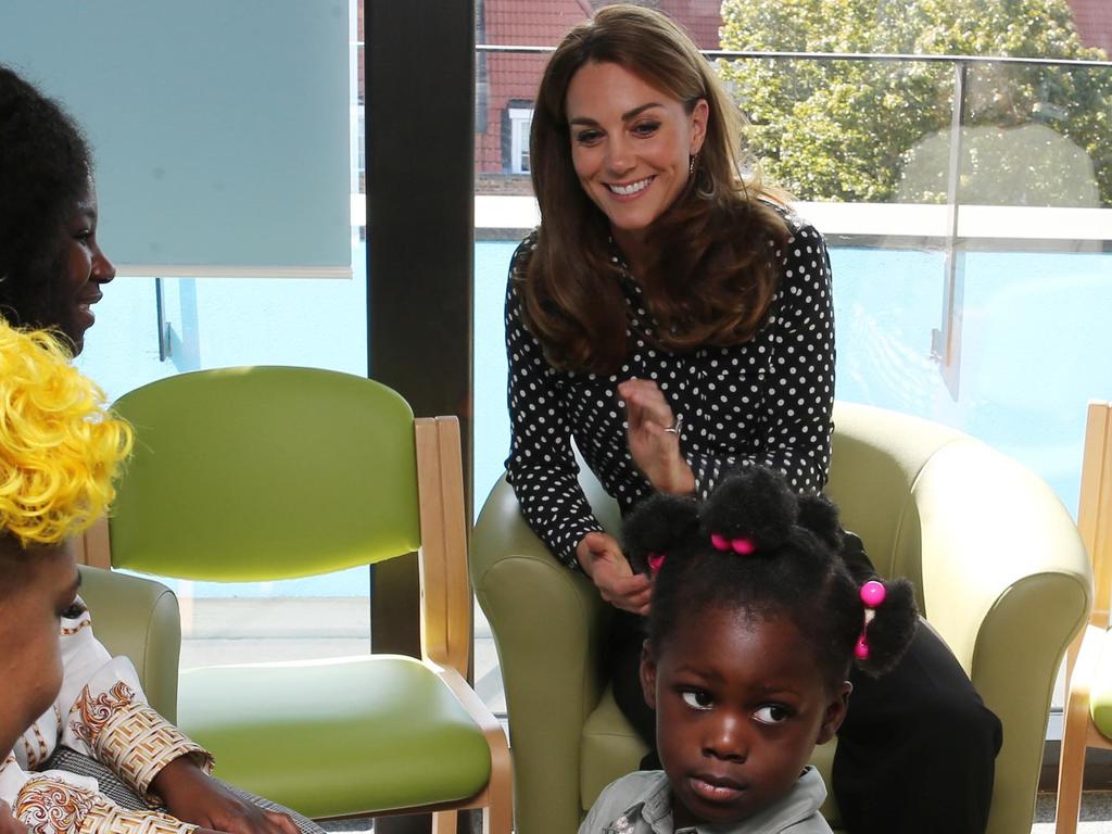 Kate dazzled in a dark blouse and high-waisted trousers. Picture: AFP