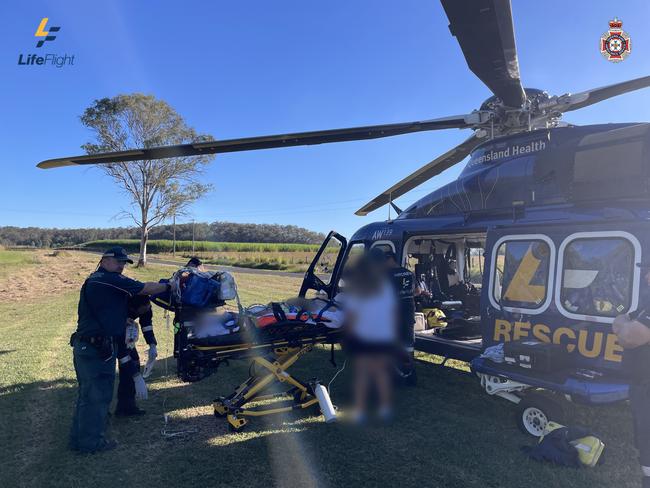 LifeFlight. A man in his 20s has been flown to hospital after suffering injuries to his spine.