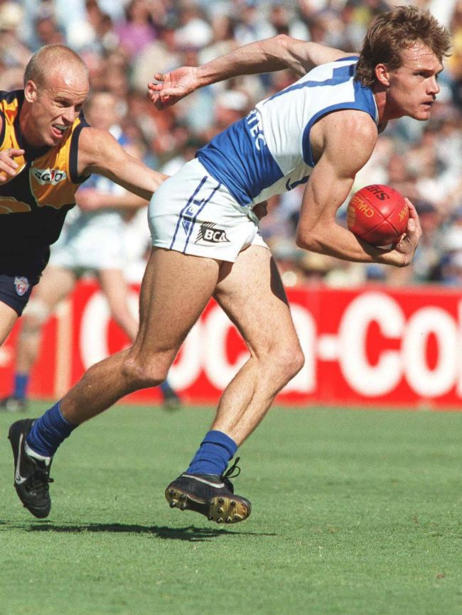 In action for North Melbourne against West Coast.