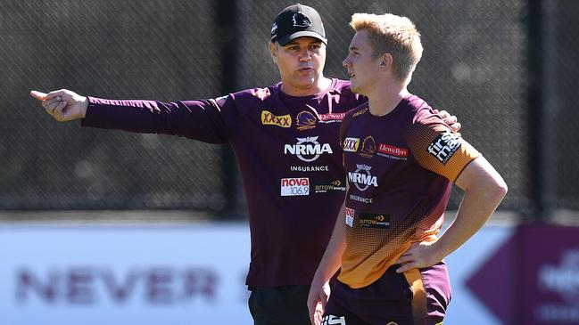 Anthony Seibold (left) talks to Tom Dearden, who is out for the season.