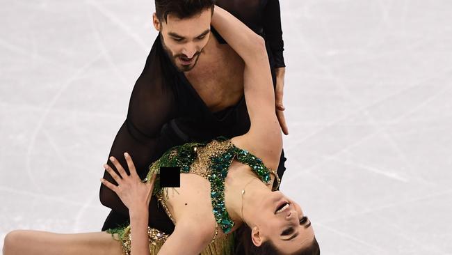 Papadakis and Cizeron during their wardrobe malfunction. Picture: AFP