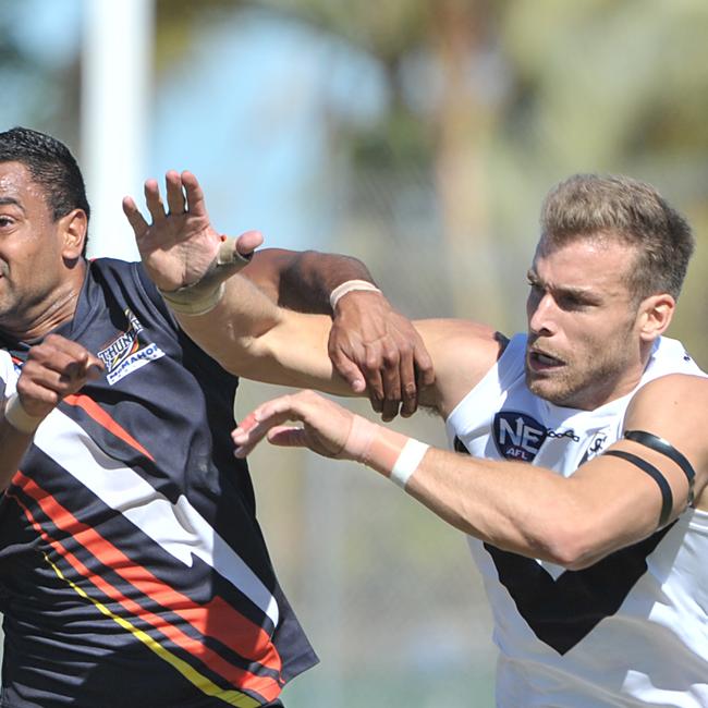 NEAFL Grand Final at H & A Oval , Broadbeach. NT Thunder v Southport. Thunders Jason Roe spoils Sharks Cleve Hughes