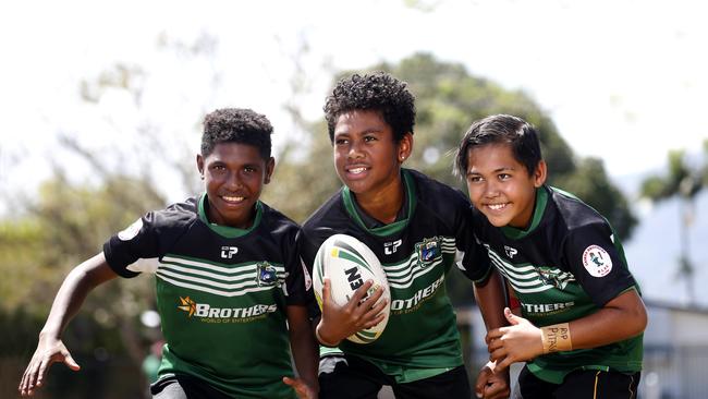 Wallace Charlie (left) pictured at 12 years of age in Cairns West Primary School kit.