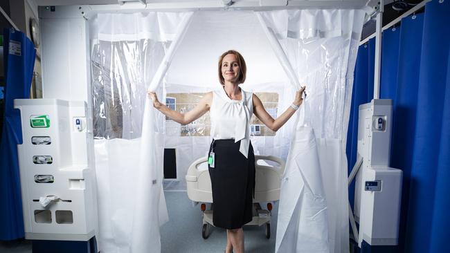 Sunshine Coast based Clinical Nurse Instructor and inventor Anna Ballantyne in front of the Rediroom she invented alongside husband Justin, and James Burkwood. The Rediroom is a compact, completely transportable pop up isolation room taking the medical world by storm. Picture: Lachie Millard