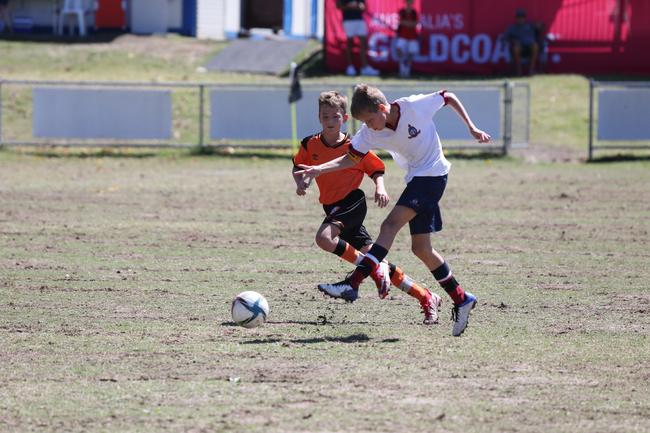 The Premier Invitational football tournament on the Gold Coast. TSS v Brisbane Roar under-13s in action. Picture: Mike Batterham.