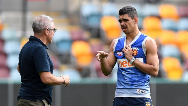 All Australian Charlie Cameron chats with Lions coach Chris Fagan. Picture: Bradley Kanaris/Getty Images