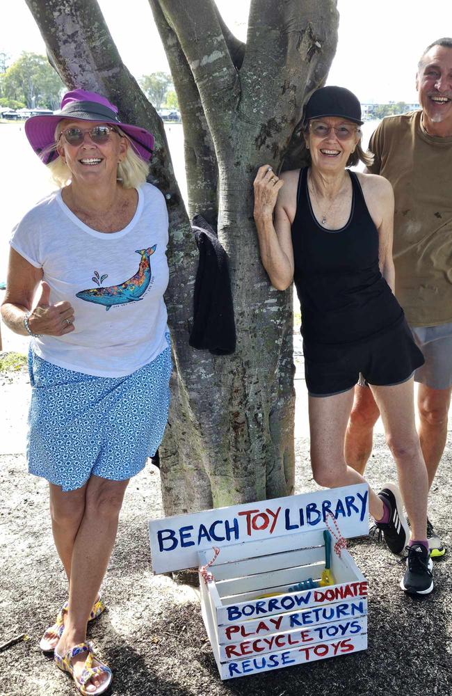 Elizabeth and Blasius Erlinger helped Dr Gregory build a Toy Library at one of the beaches along Tallebudgera Creek, to prevent lost toys being swept to sea. Left to right: Dr Sally Gregory, Elizabeth Erlinger, Blasius Erlinger. Photo supplied.