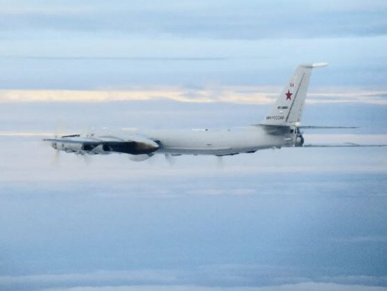 Pictures show the 'Bear' bomber flying close to the UK. Picture: Supplied