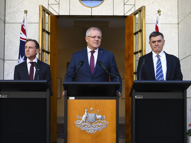 Australian Health Minister Greg Hunt, Australian Prime Minister Scott Morrison and Australia's Chief Medical Officer Professor Brendan Murphy. Picture: AAP