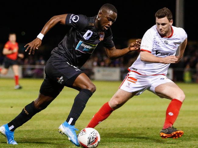 Abdiel Arroyo of the Jets contests the ball with Josh Cairelli of the Eagles during the FFA Cup Round of 16 match between the Edgeworth FC and the  Newcastle Jets at Jack McLaughlin Oval in Edgeworth, August 21, 2019.  (AAP Image/Darren Pateman) NO ARCHIVING, EDITORIAL USE ONLY