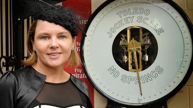 Hayley Addison at Flemington where the old-fashioned scales are still used. Picture: Nicole Garmston