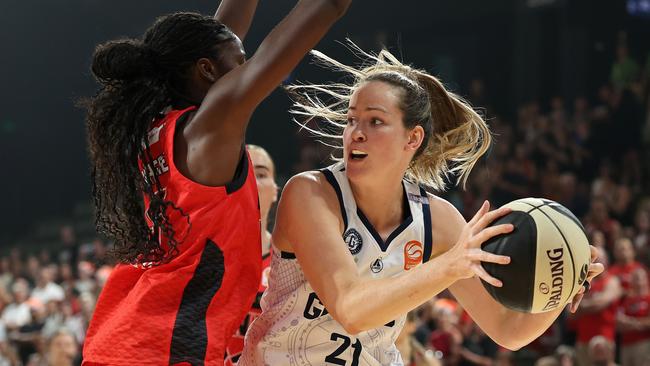 Geelong United’s Keely Froling looks to pass against Perth’s Laeticia Amihere on Monday night. Picture: Paul Kane/Getty Images.