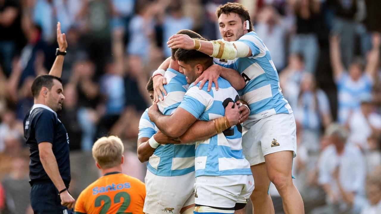 Argentina's Los Pumas celebrate. Photo by GERONIMO URANGA / AFP.