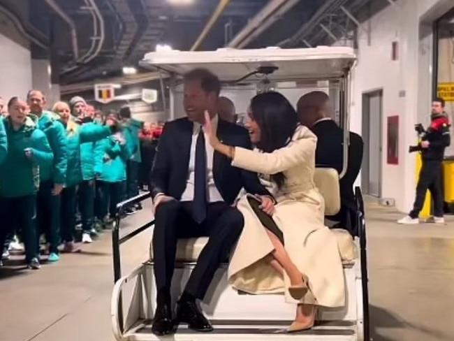 Prince Harry and Meghan Markle on the controversial golf buggy. Picture: Instagram/meghan