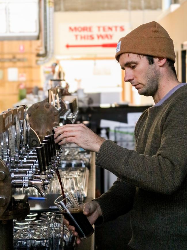 Du Cane Brewing head brewer Will Horan pours a glass of the new Du Cane Brewing and Timbre Kitchen stout. Picture: Stephanie Dalton