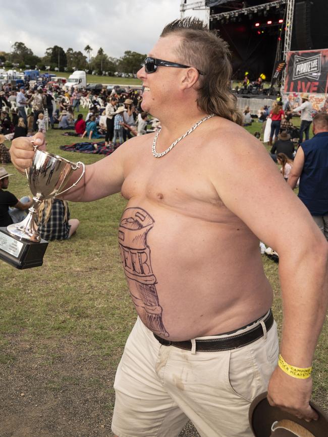 Winner of the Best Dad Bod competition is Matt Jones from Hervey Bay. Meatstock, Toowoomba Showgrounds. Saturday, April 9, 2022. Picture: Nev Madsen.