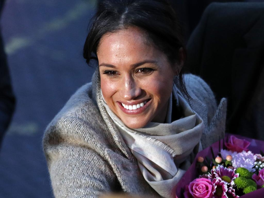 Fiancée of Britain’s Prince Harry, US actress Meghan Markle meets well-wishers as they leave after a visit to Reprezent 107.3FM community radio station in Brixton, south west London on January 9, 2018. During their visit to the station, they met some of the presenters, content producers and staff, heard more about their training programmes, and met some of the current and former volunteers who have benefitted from the training. Picture: AFP