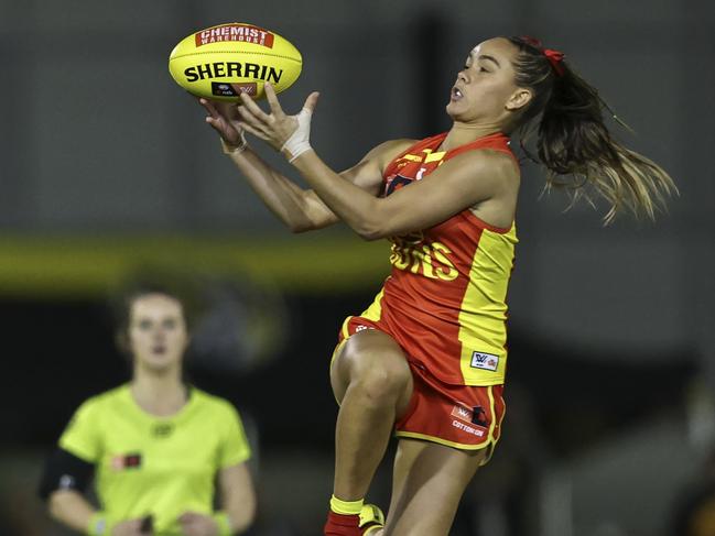 MELBOURNE, AUSTRALIA – OCTOBER 01: Jasmyn Smith of the Suns marks the ball during the round six AFLW match between the Richmond Tigers and the Gold Coast Suns at Punt Road Oval on October 1, 2022 in Melbourne, Australia. (Photo by Martin Keep/AFL Photos via Getty Images)