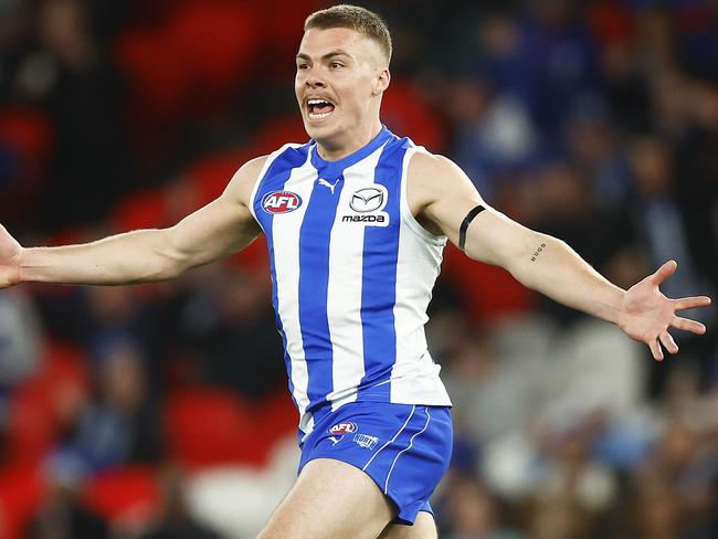 *APAC Sports Pictures of the Week - 2022, July 18* - MELBOURNE, AUSTRALIA - JULY 16: Cameron Zurhaar of the Kangaroos celebrates kicking a goal during the round 18 AFL match between the North Melbourne Kangaroos and the Richmond Tigers at Marvel Stadium on July 16, 2022 in Melbourne, Australia. (Photo by Daniel Pockett/Getty Images)