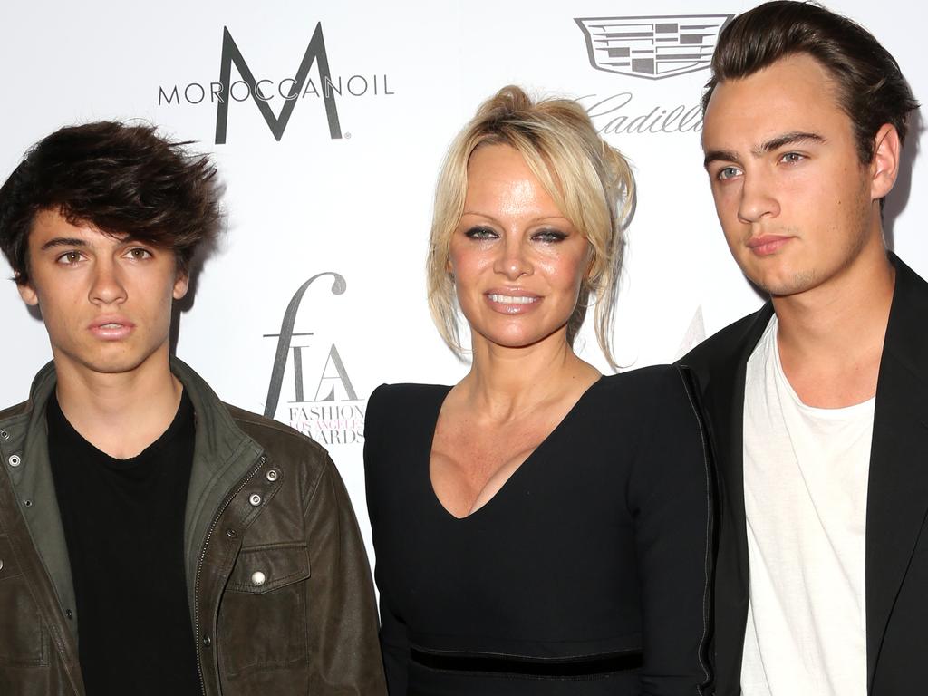 Pamela Anderson (C) and her sons Brandon Thomas Lee (R) and Dylan Jagger Lee. Picture: Getty