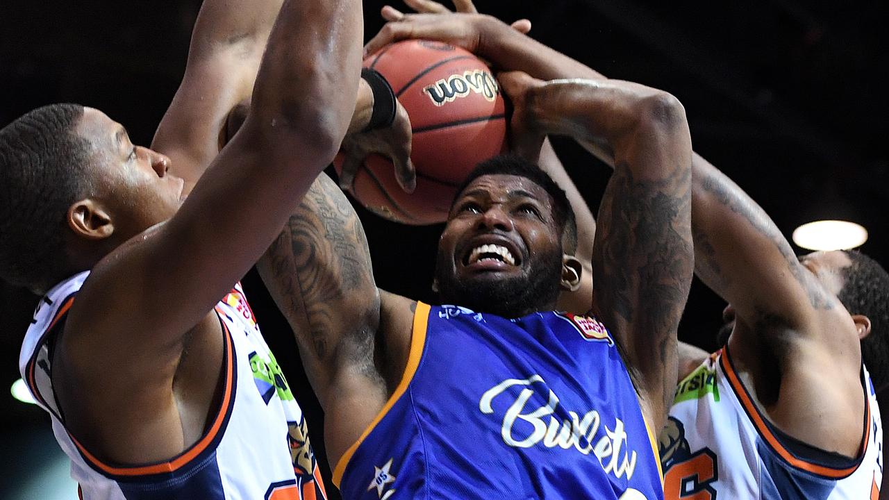 Brisbane Bullets star Alonzo Gee is blocked by the Cairns Taipans defence on Saturday night. Picture: AAP