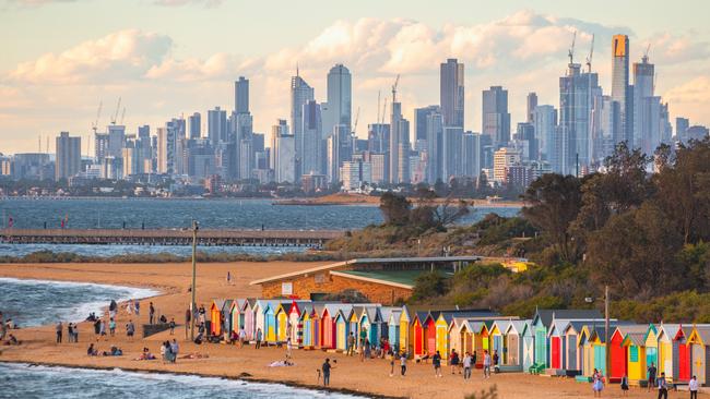 Brighton bathing boxes and Melbourne skyline.Escape 27 August 2023Twin Share - Neil WhitakerPhoto - Getty Images