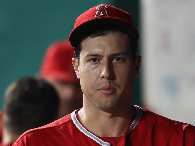 (FILES) In this file photo taken on April 26, 2019, atarting pitcher Tyler Skaggs #45 of the Los Angeles Angels is congratulated by teammates in the dugout after striking out Ryan O'Hearn #66 of the Kansas City Royals for the third out with the bases loaded during the 4th inning of the game at Kauffman Stadium in Kansas City, Missouri. - Los Angeles Angels pitcher Tyler Skaggs has died before a scheduled July 1, 2019 game against the Texas Rangers that has been postponed, the Major League Baseball clubs announced. The 27-year-old left-hander from Los Angeles was found dead in a Texas hotel room. No cause of death was immediately known. (Photo by JAMIE SQUIRE / GETTY IMAGES NORTH AMERICA / AFP)