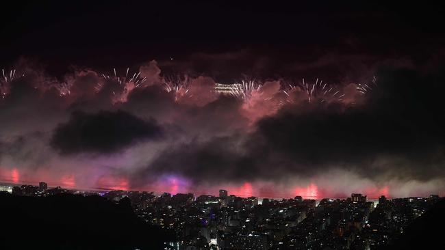 Fireworks to celebrate the new year go off at Copacabana beach as seen from Corcovado mountain during celebrations in Rio de Janeiro. Picture: AFP