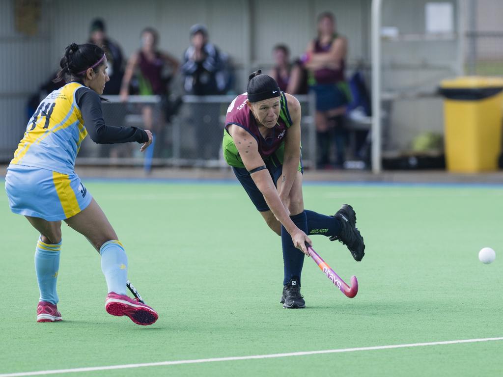 Tammy Drews (right) of Redlands 1 against Cairns 1.