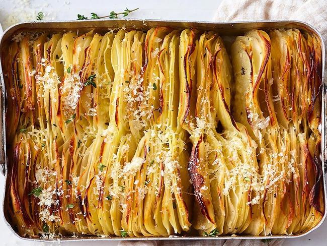 Crispy garlic and thyme boulangere potatoes.