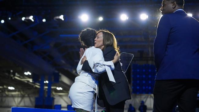 Cardi B and Kamala Harris hug on stage during a campaign rally at the Wisconsin State Fair Park Exposition Center. Picture: Andrew Harnik/Getty Images