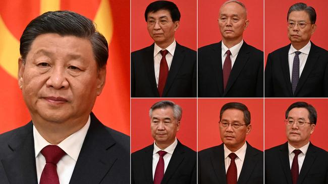 China’s President Xi Jinping and members of the Communist Party of China’s new Politburo Standing Committee. Top second left to right: Wang Huning, Cai Qi, Zhao Leji and, bottom second left to right,: Li Xi, Li Qiang and Ding Xuexiang, as they meet the media in the Great Hall of the People in Beijing on Sunday. Picture: Noel Celis / AFP