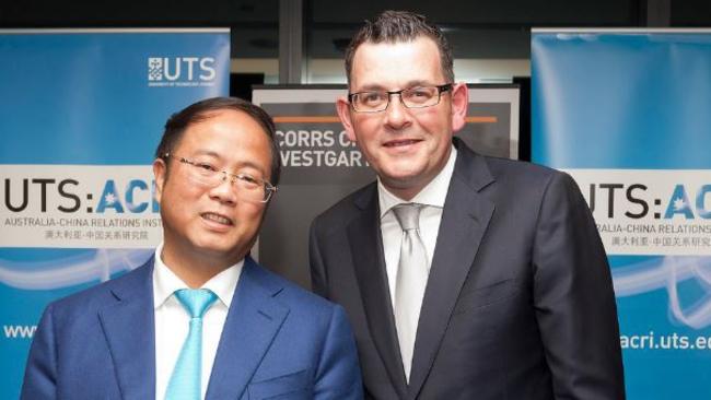 Huang Xiangmo and Daniel Andrews.