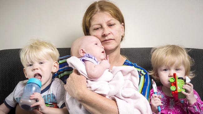 Leanne Jokic, the partner of motorcycle crash victim Tim Pysarenko, with their three children Liam, 2, Emma, 10 weeks, and Taylor, 1. Picture: Eugene Hyland