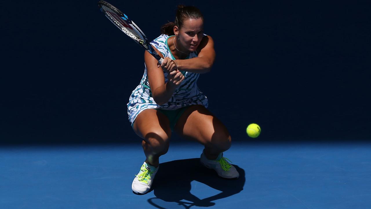 MELBOURNE, AUSTRALIA - JANUARY 19: Jarmila Gajdosova of Australia plays a backhand in her first round match against Alexandra Dulgheru of Romania during day one of the 2015 Australian Open at Melbourne Park on January 19, 2015 in Melbourne, Australia. (Photo by Michael Dodge/Getty Images)
