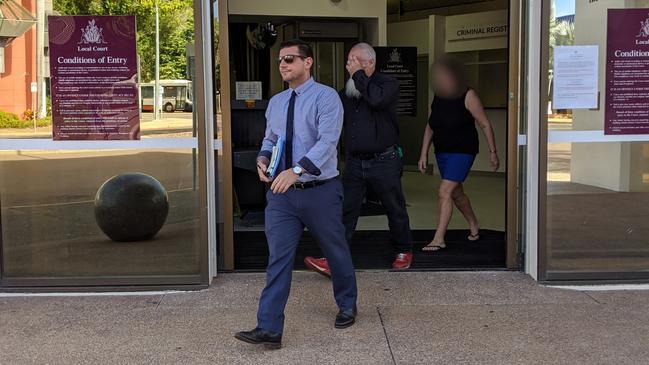 Alleged Hells Angel Adrian Lyle Cook leaves the Darwin Local Court with his lawyer Shane McMaster on Monday.