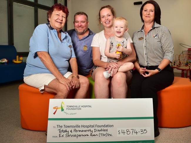 TPI Association representatives Julie Christopher and Tony Earwaker, Connor McCabe, 2, with his Mum Bianca Burns and Kath Bradwell, Kirwan Tavern, pictured with a cheque for $4874.35 which TPI in association with the Kirwan Tavern have donated to Pediatrics services at the Townsville University Hospital. Picture: Shae Beplate.