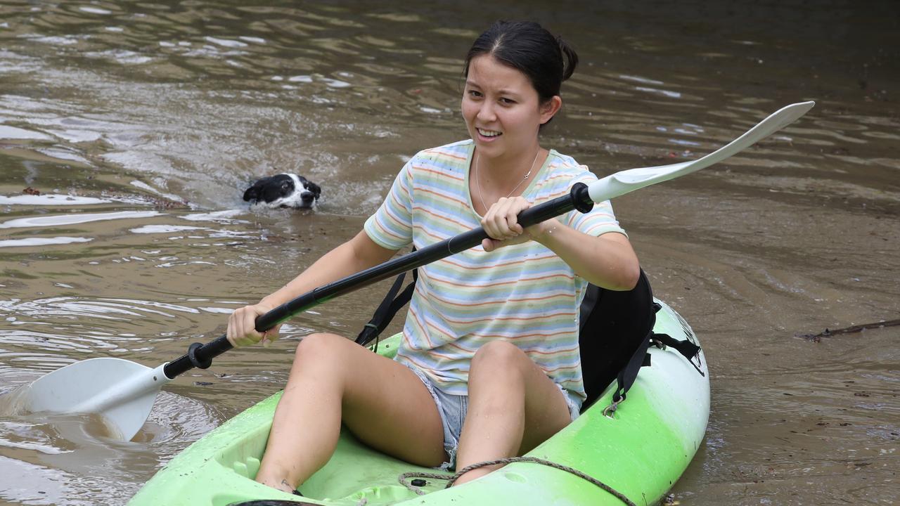 Aimee O’Hara rescues her dog. Picture: Annette Dew