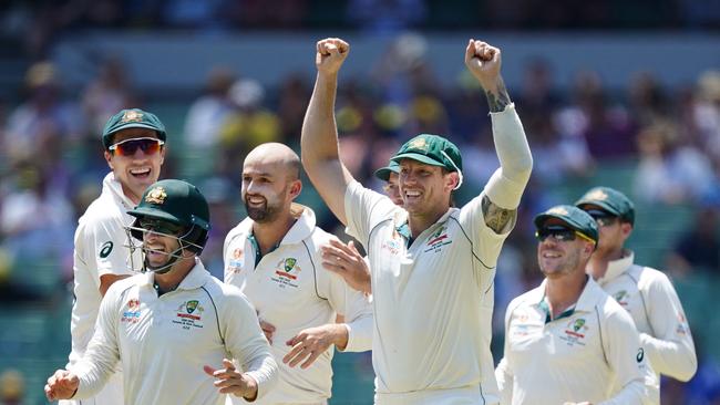 Pat Cummins of Australia, Matthew Wade of Australia, Nathan Lyon of Australia, James Pattinson of Australia and David Warner of Australia celebrate after Tim Paine of Australia stumped Henry Nicholls of New Zealand from the bowling of Nathan Lyon of Australia on day 4 of the Boxing Day Test match between Australia and New Zealand at the MCG in Melbourne, Sunday, December 29, 2019. (AAP Image/Scott Barbour) NO ARCHIVING, EDITORIAL USE ONLY, IMAGES TO BE USED FOR NEWS REPORTING PURPOSES ONLY, NO COMMERCIAL USE WHATSOEVER, NO USE IN BOOKS WITHOUT PRIOR WRITTEN CONSENT FROM AAP