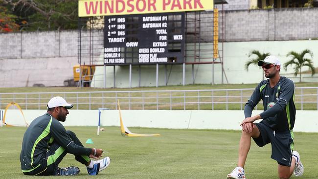 Fawad Ahmed and Nathan Lyon warm up for an Australian nets session at Windsor Park.