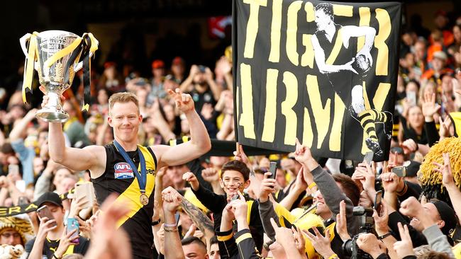 Jack Riewoldt celebrates his second premiership with adoring Richmond fans.