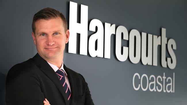 Managing Director of Harcourts Coastal, Dane Atherton, at his Broadbeach office. Picture: Glenn Hampson.