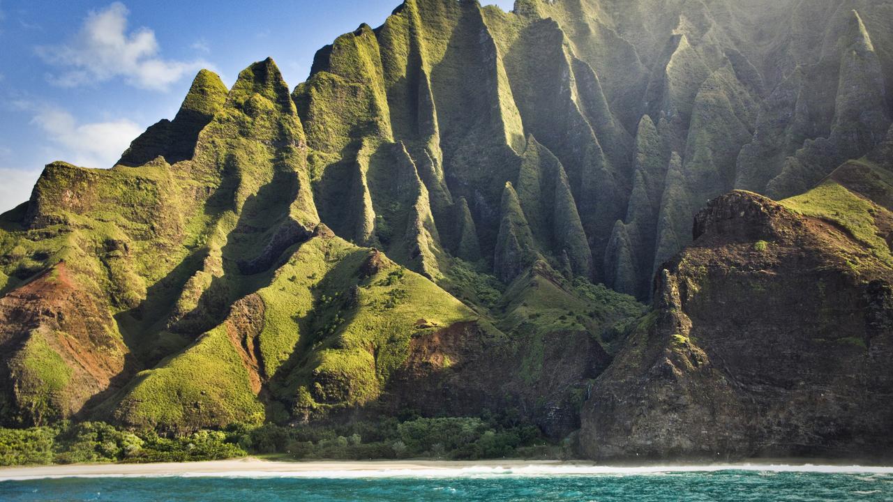 Do yourself a favour and escape the popular beaches of Oahu, for the scenic island of Kauai. Picture: iStock