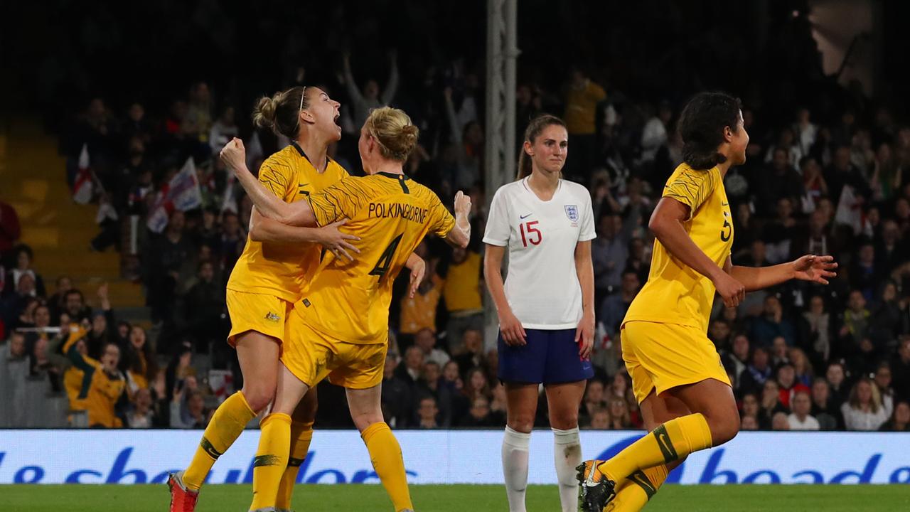Clare Polkinghorne of Australia celebrates after she scores her sides first goal