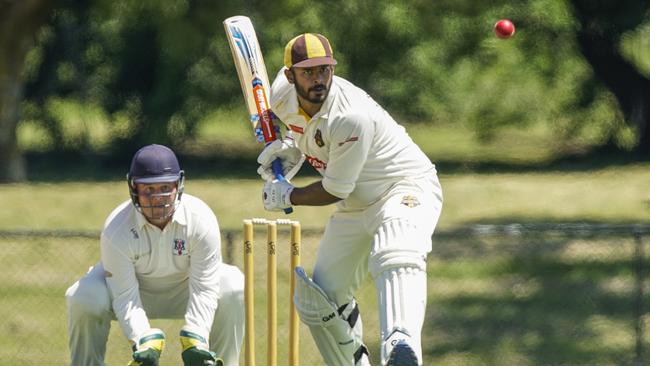 Long Island keeper Aiden McKenna and Kavinda Pulukkuttiarachchi batting for Heatherhill.