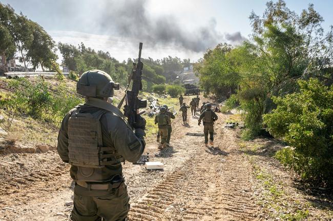 A picture released by the Israeli army on January 26, 2024 shows Israeli soldiers operating in the Gaza Strip